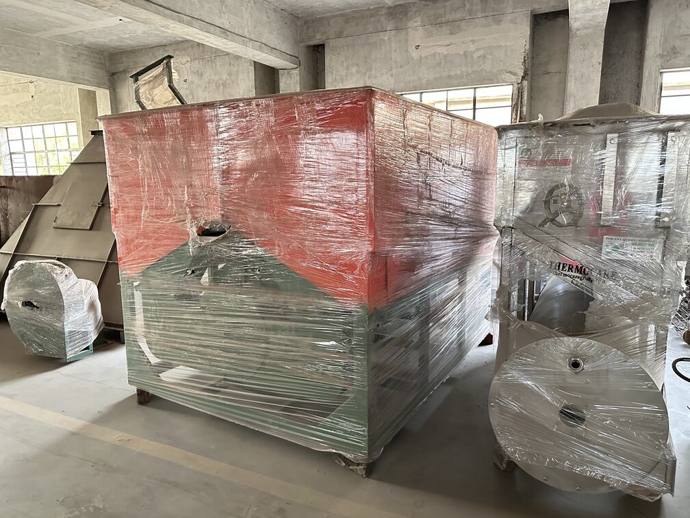 Stainless steel mixing equipment in production at Rajeev Food Tech